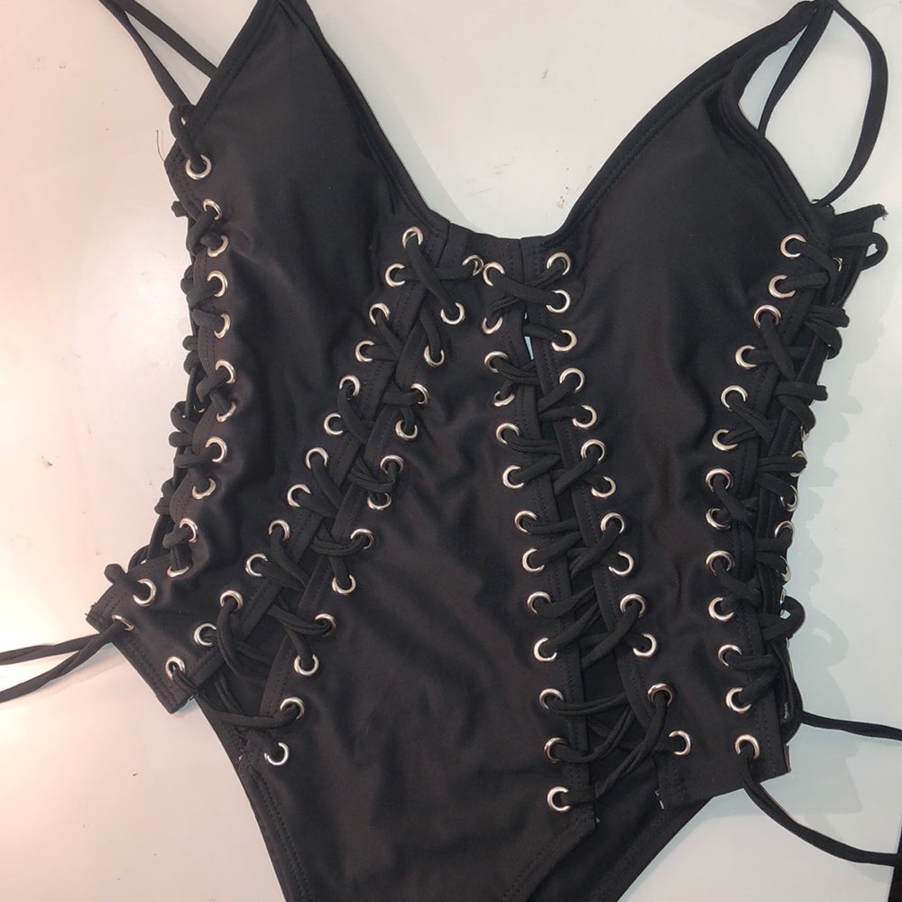 Black laced up one piece suit